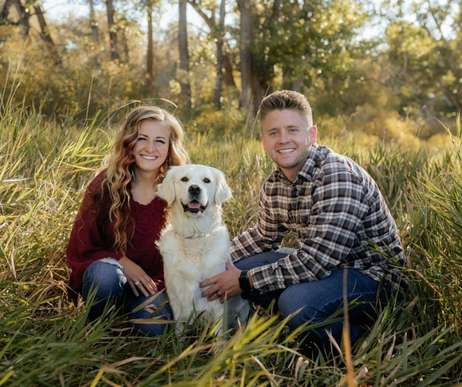 Tanner Flint with his wife Kelsey and dog Bama